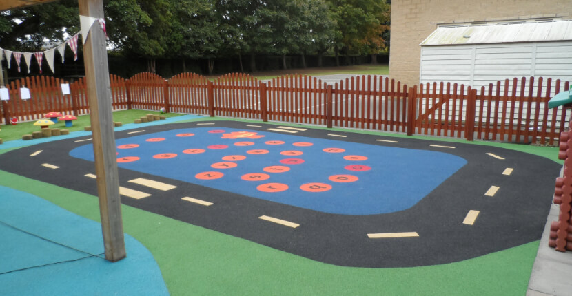 Wet pour rubber playground repair in London school